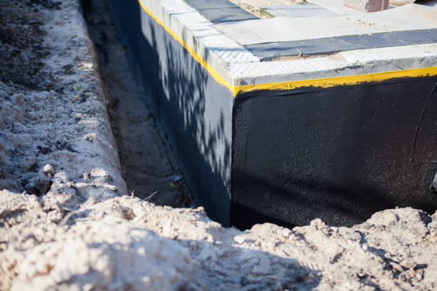 Professional Foundation Crack Repair technician working in Holt, MI